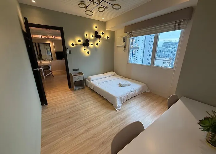 2br In Mandaluyong With Sunrise View, 65 Inch Oled Tv And Disneyplus Manila